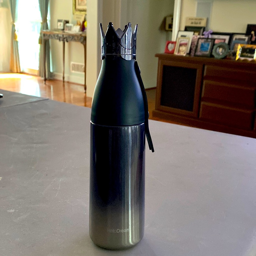 Hot/cold thermos/water bottle with princess crown lid that can be used for cup!